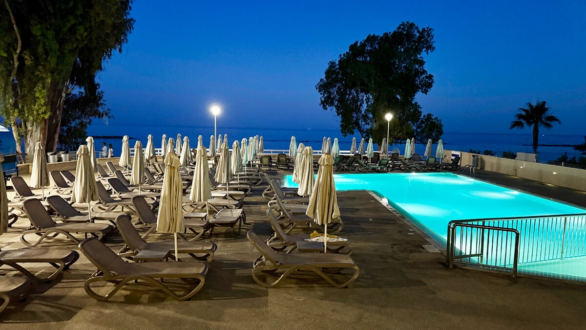 Hotel swimming pool overlooking the Mediterranean Sea in Paphos, Cyprus